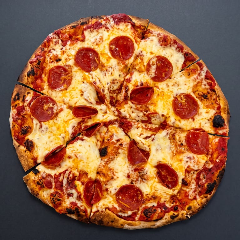 Indulge in our cheese pizza